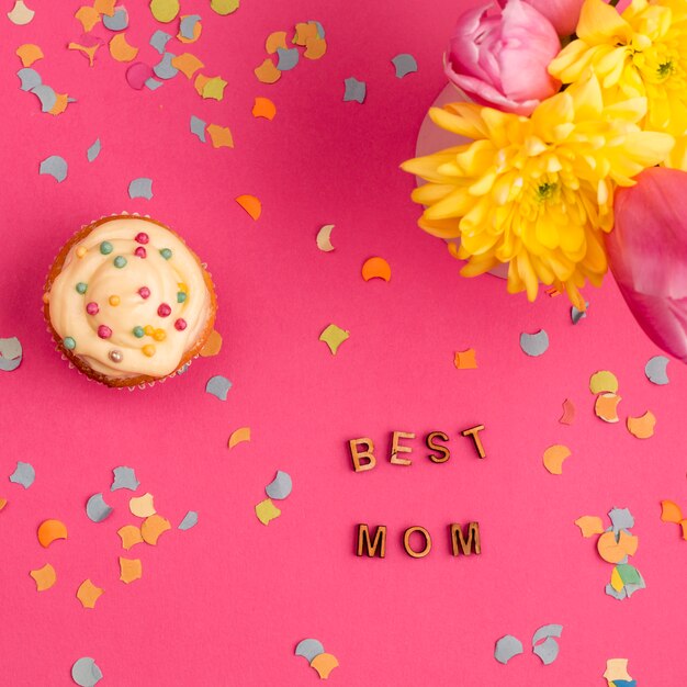 Best mom words near cupcake and flowers