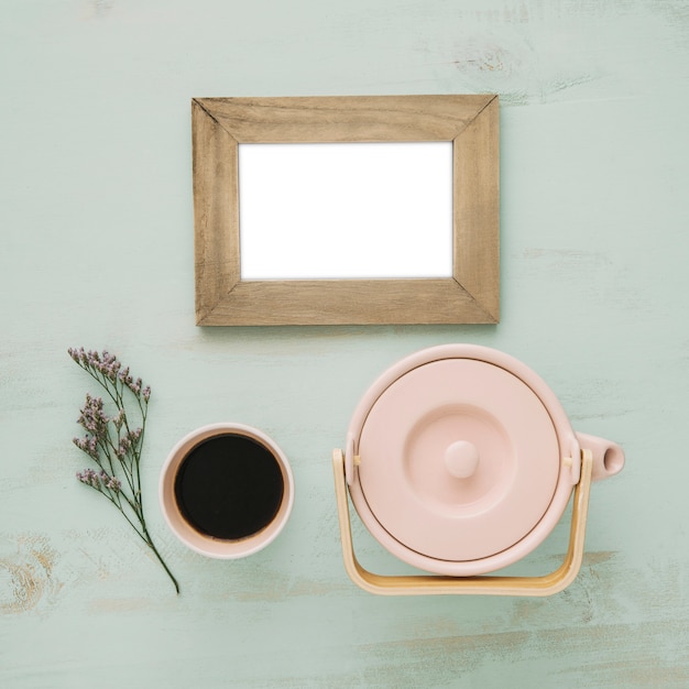 Beverage and flower near frame