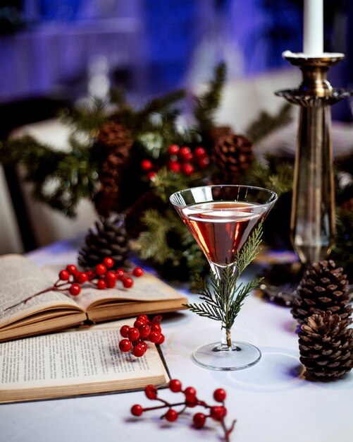 Beverage served in glass and books