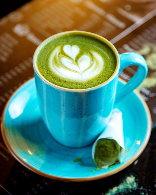 Free photo beverage with green foam