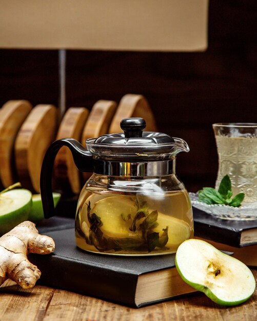 Beverage with herbs in the pot