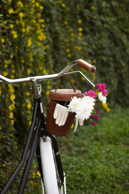 Bicycle basket with beautiful flowers back view