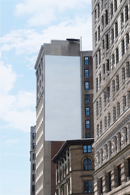 Free photo big billboard template on building in city