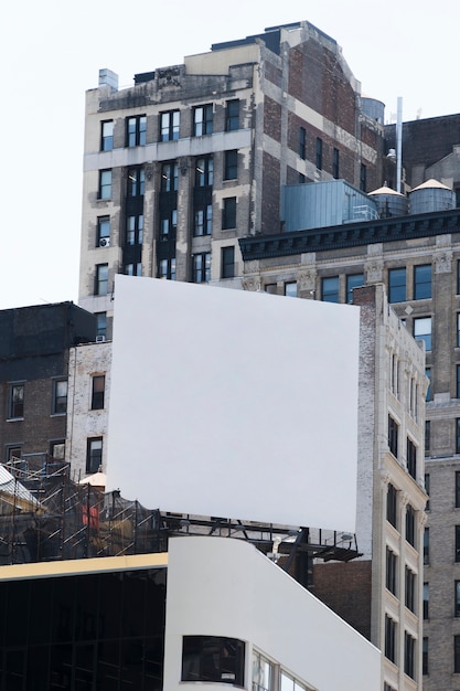 Free photo big billboard template on building in city