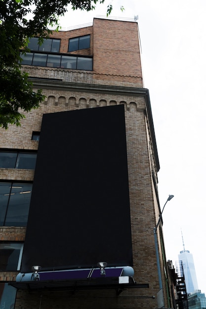 Big billboard template on building in city