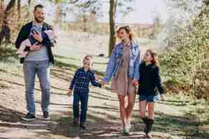 Free photo big family with kids together in the forest