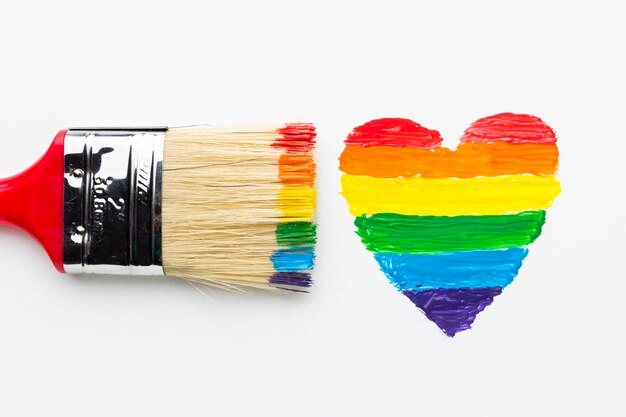 Big paint brush and rainbow heart close-up