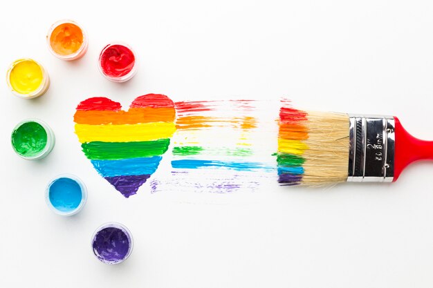 big paint brush and rainbow heart and tempera