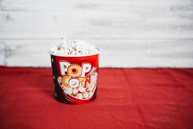 Big popcorn bucket on red cloth