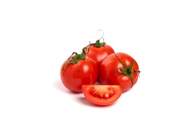 Big red fresh tomatoes on a white background.