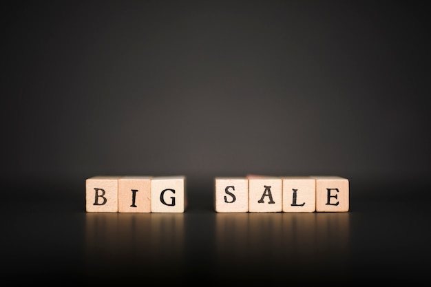 Big sale inscription on small wooden blocks