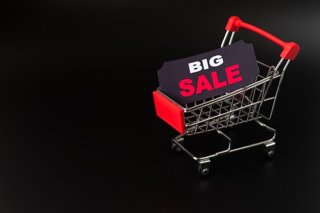 Big sale sticker in shopping cart