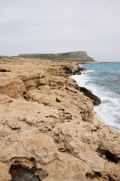 Free photo big stones on the shore during daytime in cyprus