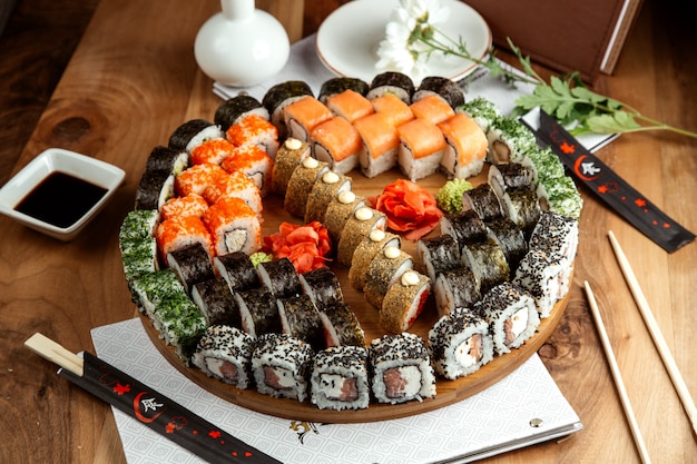 big sushi set philadelphicalifornimidori makki and hot rolls on board on board