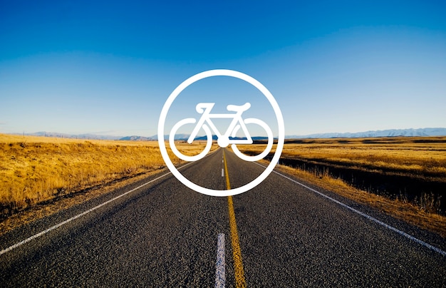 Bike banner shape in circle with rural street scenic and mountain range landscape view