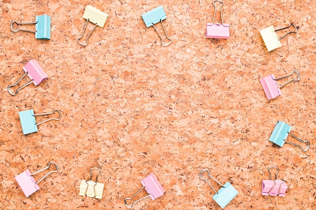 Binder clips on wooden table