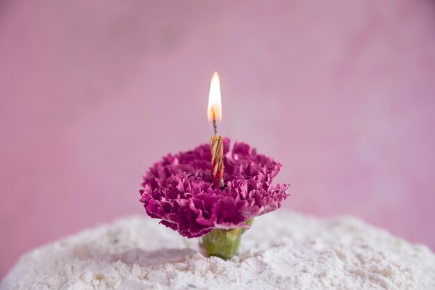 Birthday cake in front of watercolor background