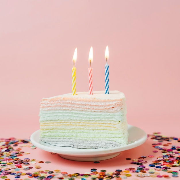 Birthday cake with lit candles