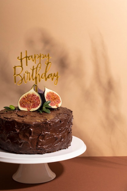 Birthday chocolate cake with fruits