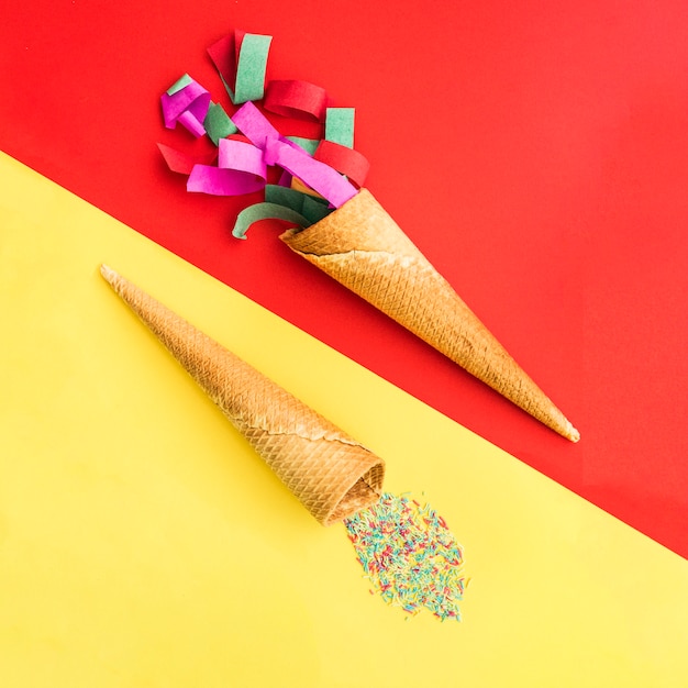 Free photo birthday composition with colored background and ice cream cones