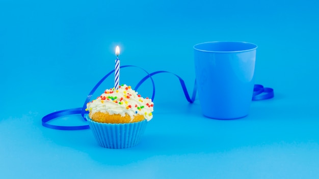 Free photo birthday cupcake with candle