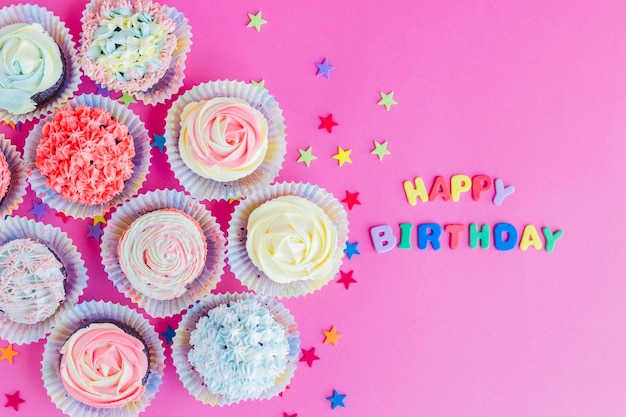 Free photo birthday cupcakes in arrangement