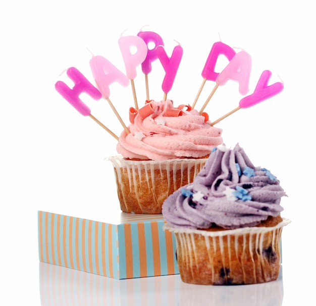 Free photo birthday cupcakes with colorul latters