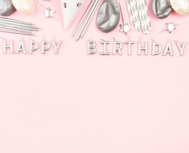 birthday decorations on pink background