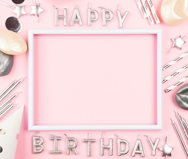 birthday ornaments on pink background