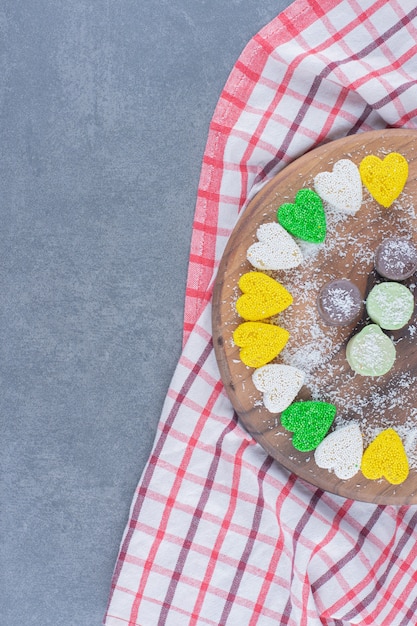 Biscuit and cookies on the board , on the marble background. 