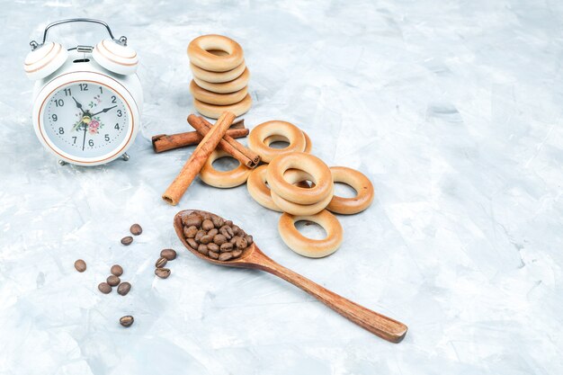 Biscuits with coffee beans on grungy background