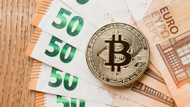 bitcoin on banknotes arrangement