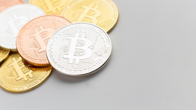 Bitcoin in various colors close-up