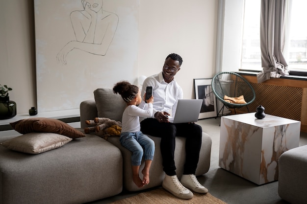 Black baby spending time with her dad