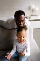 Free photo black baby spending time with her dad