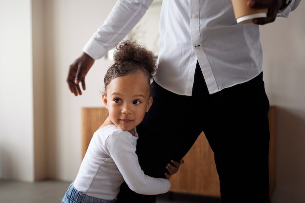 Black baby spending time with her dad