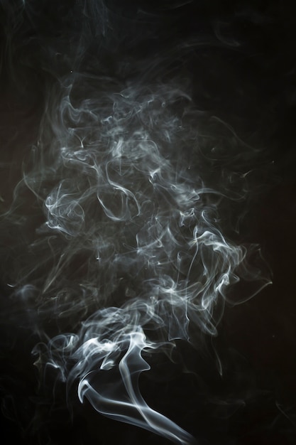 Black background with dynamic smoke silhouette