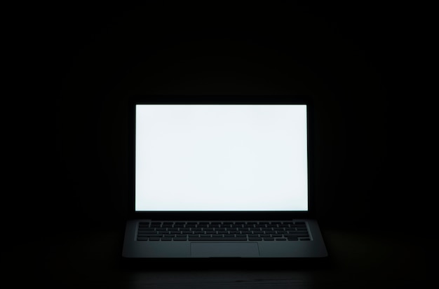 Black background with laptop