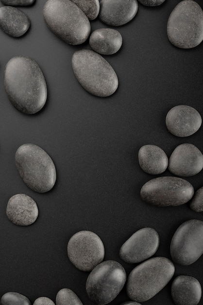 Free photo black background with rocks