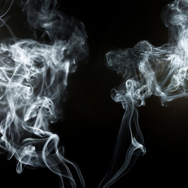 Бесплатное фото Черный фон с эффектом дыма