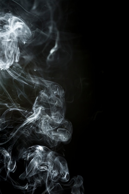 Black background with smoke silhouette