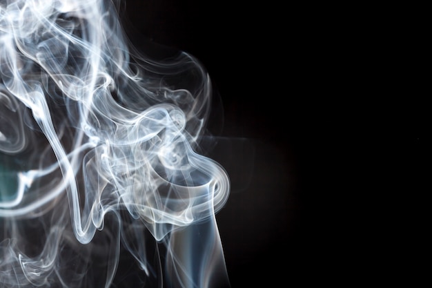 Black background with smoke