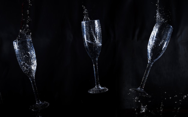 Black background with three water glasses