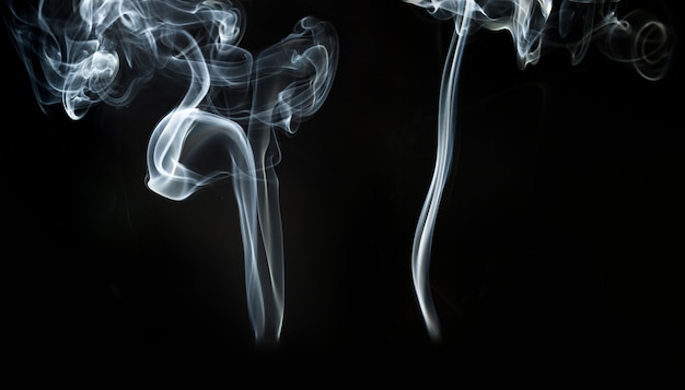 Black background with white smoke effect