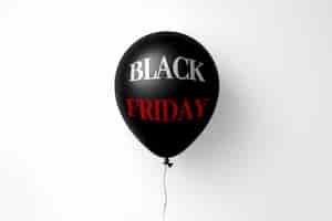 Free photo black balloon floating on white background with black friday message