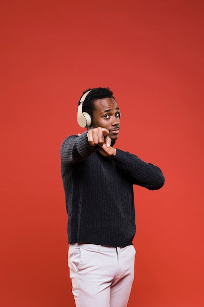 Black boy posing with headphones