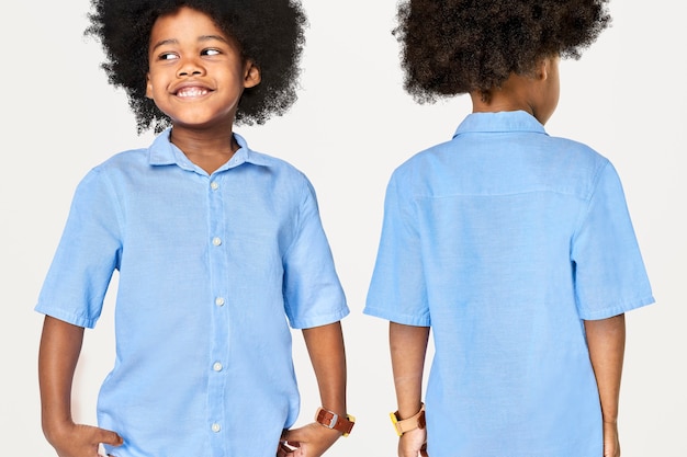 Free photo black boy wearing blue shirt in studio