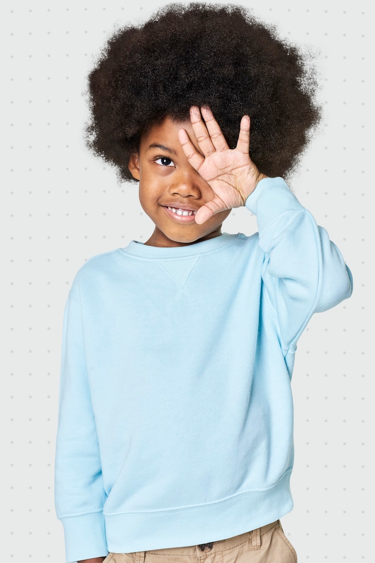 Free Photo black boy wearing blue sweater