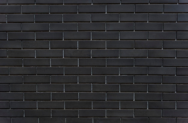 Black brick wall textured background