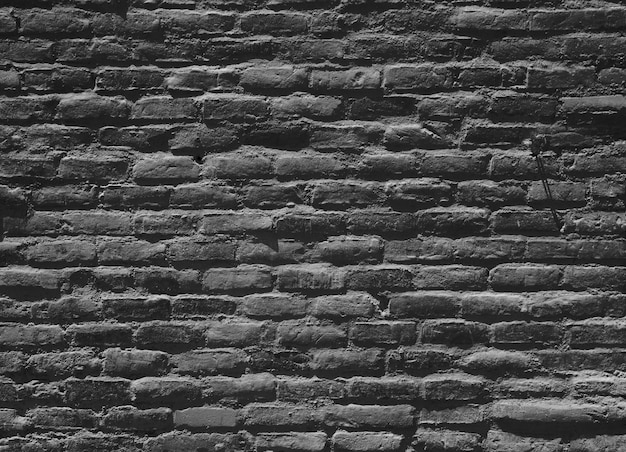 Free photo black brick wall